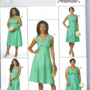 May include: A sewing pattern for a dress with a V-neck, sleeveless, and a-line skirt. The pattern is for sizes 8-10-12-14-16. The pattern is called Butterick B5461.