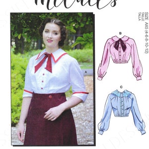 May include: A sewing pattern for a women's blouse with three different styles. The pattern is from McCall's and is designed by Angela Clayton. The pattern includes instructions for making a white blouse with a red bow, a pink blouse with a black bow, and a light blue blouse with a ruffled collar.