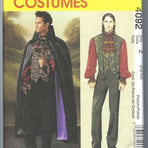 May include: McCall's Costumes pattern featuring a man in a black cape with purple lining and a ruffled shirt. The pattern also shows a man in a red shirt, vest, and black pants. The text "McCall's Costumes" is at the top.