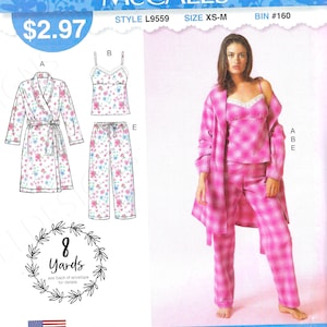 May include: A sewing pattern for a pink and white pyjama set with a matching robe. The pattern includes a camisole top, trousers, and a robe. The pattern is for sizes XS-M and requires 8 yards of fabric. The pattern is made in the USA.