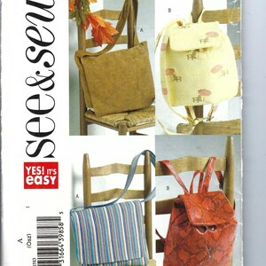 May include: A sewing pattern featuring various bag designs. The bags include a brown suede-like tote, a yellow backpack with a flap, a blue and white striped shoulder bag, and a red snakeskin-patterned backpack.