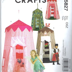 May include: A sewing pattern for making three different play tents. The tents are a pirate tent with a skull and crossbones, a camouflage tent, and a princess tent with a pink and white design. The pattern is from McCall's Crafts and is size OSZ.