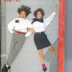 May include: A sewing pattern for a white button-down shirt with a black and white striped skirt and a pair of gray plaid pants. The pattern is from Butterick and is for sizes 6-8-10. The pattern is called "Esprit Sport".
