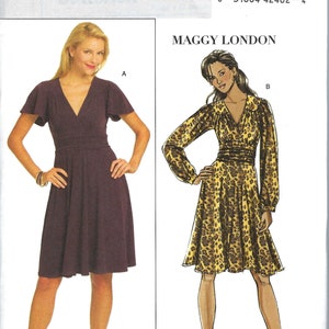 May include: A sewing pattern for a dress with two different styles. The first style is a solid purple dress with short sleeves and a V-neck. The second style is a leopard print dress with long sleeves and a V-neck. The pattern is for sizes 8-10-12-14. The pattern is called "Maggy London" and is from Butterick.