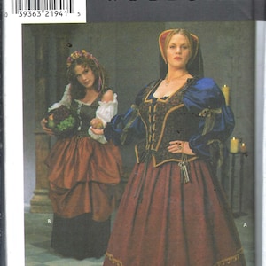 May include: Simplicity Costumes pattern featuring two medieval-style dresses. One dress is burgundy with gold trim, a black bodice, and blue sleeves. The other is a brown and black dress with a white blouse and a basket of fruit.