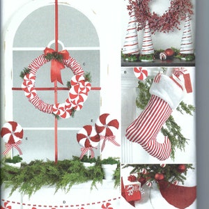 May include: A Simplicity sewing pattern for making Christmas decorations. The pattern includes instructions for making a candy cane wreath, candy cane trees, a stocking, and a candy cane garland. The pattern is labeled "R11655" and "easy-to-sew".