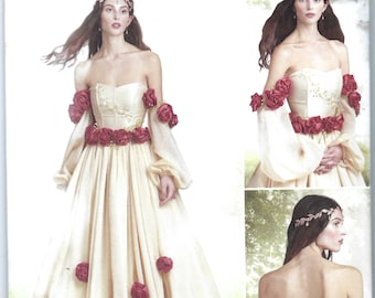 May include: Simplicity pattern S9577 for a costume with a white dress with red rose embellishments. The pattern is for sizes US 14-22, Euro 40-48, and French 42-50.