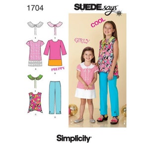 May include: A sewing pattern for girls' clothing with a variety of styles, including a dress with a geometric print, a top with a floral print, and a pair of pants. The pattern is called "Suede says" and the number is 1704.