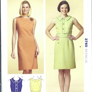 Könnte beinhalten: Kwik Sew Schnittmuster 3760 für Damenkleider. Das Schnittmuster zeigt zwei Kleiderdesigns, eines in Orange und eines in Grün, mit zusätzlichen Designoptionen. Größen XS-L sind enthalten. Das Muster enthält den Text "KWIK SEW" und "BY KERSTIN MARTENSSON."