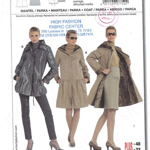 May include: A Burda sewing pattern featuring three coat designs. The pattern includes sizes 10-22 and European sizes 36-48. The image shows models wearing the coats. The pattern also includes the text "HIGH FASHION FABRIC CENTER".