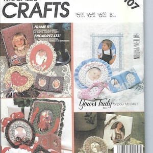 May include: McCall's Crafts pattern featuring various picture frame designs. The frames come in diverse shapes and sizes, with decorative elements like ruffles and fabric patterns. The cover includes the text "Frame It!" and "Yours Truly".