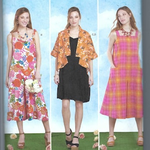 May include: A sewing pattern for three different dresses. The pattern is for sizes 8-16, 34-42, and 36-44. The dresses are a floral print, a black dress with a matching orange jacket, and a pink and orange plaid dress.