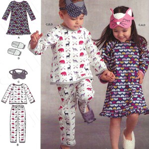 May include: A sewing pattern for children's pajamas and sleep masks. The pattern includes a nightgown with a floral print, a long-sleeved top and pants with a woodland animal print, and two sleep masks with cat and fox designs. The pattern is for sizes 3-8.