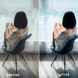May include: A woman sits in a black chair by a window, holding a white mug. She is wearing a white t-shirt and has short black hair.