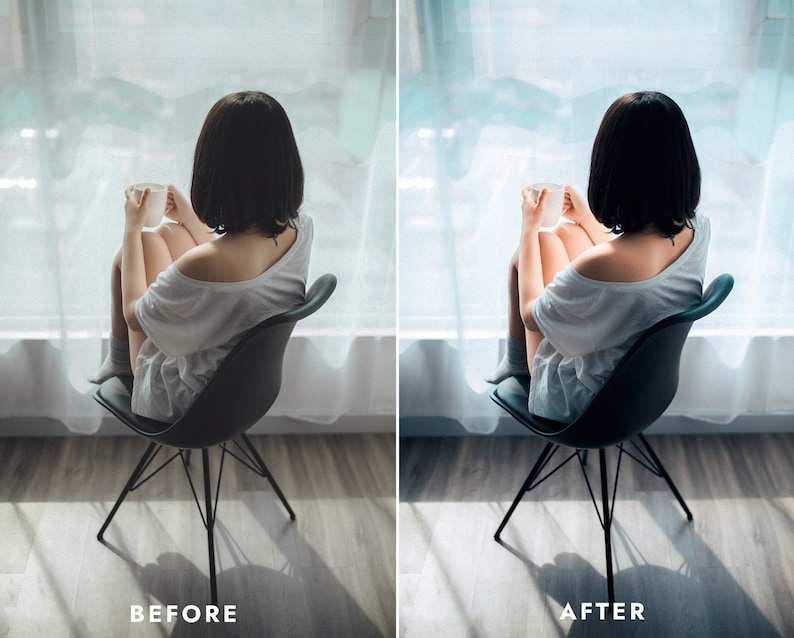 May include: A woman sits in a black chair by a window, holding a white mug. She is wearing a white t-shirt and has short black hair.