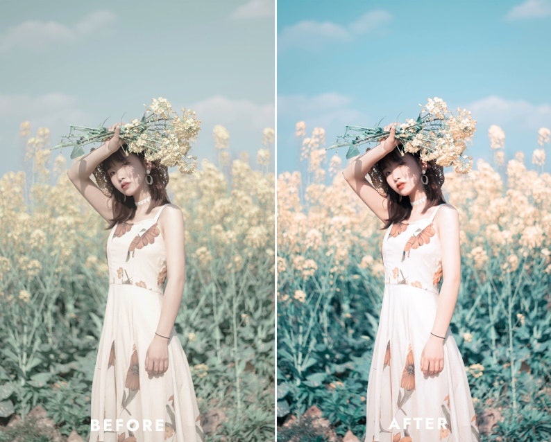 May include: A woman in a white dress with a floral pattern stands in a field of yellow flowers. She is holding a bouquet of white flowers above her head. The background is a blue sky.