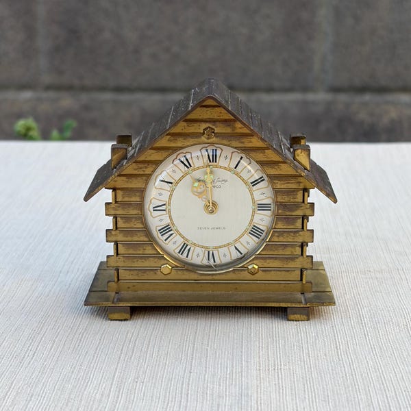 Relógio de mesa vintage Helveco Chalet Seven Jewels com caixa de música em latão – Funcionando, com mecanismo decorativo.
