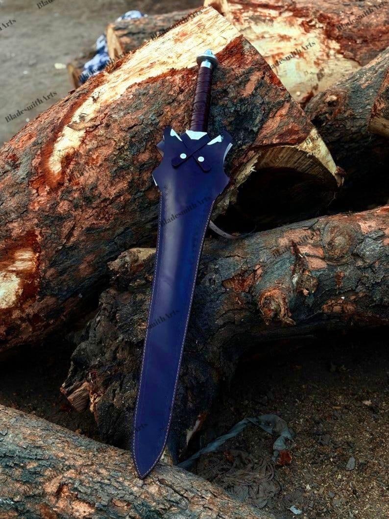 May include: A sword encased in a dark purple leather sheath with a cross-stitched design near the hilt. The hilt features a dark brown wrapped handle and a metallic pommel. The sheath has a distinct pointed shape with visible stitching along the edges.