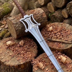 May include: A double-edged steel sword featuring a pointed blade, a central fuller, and a stylized guard with curved cutouts. The handle is wrapped in brown leather, and the pommel is a simple metal cap. The sword is positioned diagonally.