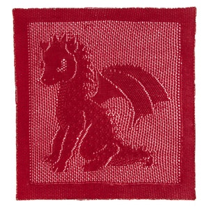 May include: Red knitted baby blanket with a dragon design.