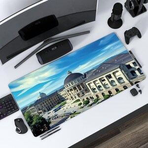 May include: A large, detailed, colourful illustration of a university campus building with a blue sky and white clouds. The building is a large, multi-storey structure with a dome on top. The building is surrounded by trees and grass.