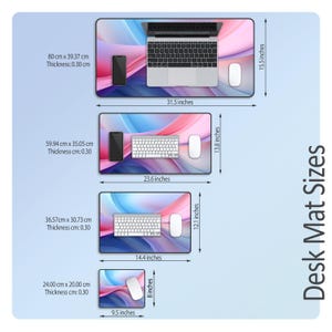 May include: Four different sizes of desk mats with a pink and blue abstract design. The mats are shown with a keyboard, mouse, and phone on them. The mats are available in 8, 12, 14, and 31 inches.