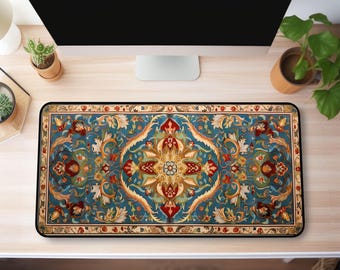 May include: A blue and gold patterned desk mat with a traditional Persian design. The mat is rectangular and has a black border.