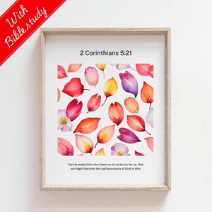 Può includere: Una stampa incorniciata con un designo ad acquerello di foglie e fiori colorati. La stampa presenta il versetto biblico 2 Corinzi 5:21, "Poiché colui che non conobbe peccato, egli lo fece peccato per noi, affinché noi diventassimo giustizia di Dio in lui."