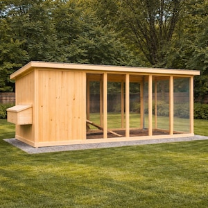 May include: A large, rectangular wooden chicken coop with a nesting box and a screened-in run. The coop is made of light-colored wood and sits on a gravel base, with a green lawn in the foreground and trees in the background.