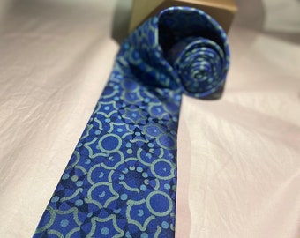 A luxury blue tie of Nobel Prize winner Prof. Dan Shechtman. Boutique tie, special limited edition. Suitable for formal and casual events.