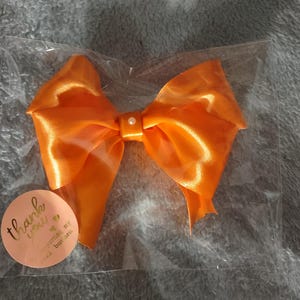 Orange Hair bow. (Double loop)