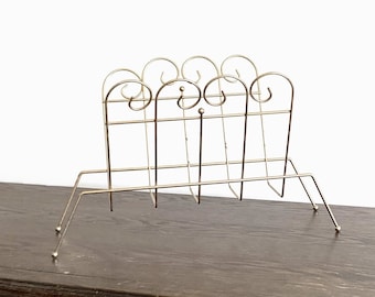 Mid century goldtone metal magazine rack