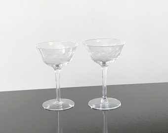 Crystal champagne stems, pair of vintage etched floral pattern wine glasses