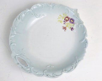 Antique embossed porcelain serving bowl