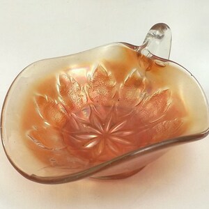 Dugan carnival glass nappy dish, iridescent marigold image 2