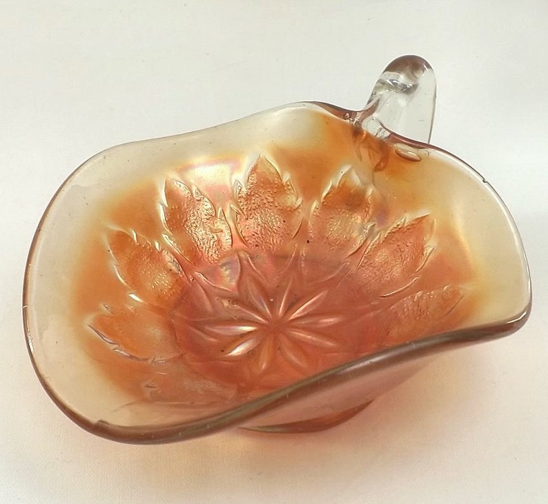 Dugan carnival glass nappy dish, iridescent marigold image 2