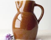 Brown stoneware pottery pitcher 