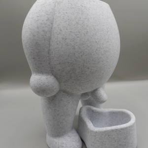 Peeing Statue Flower Pot