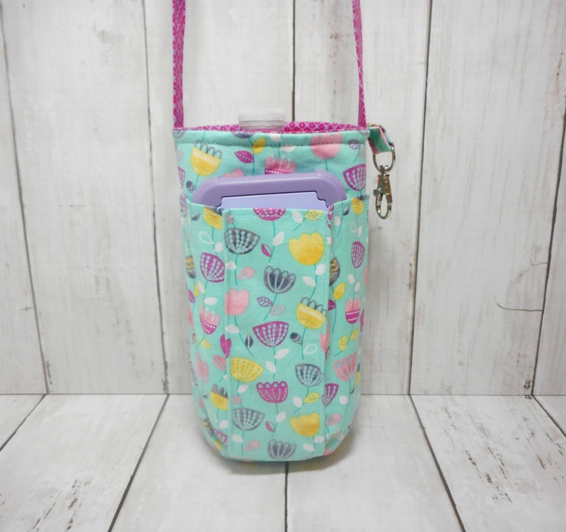 purse with hidden bottle compartment