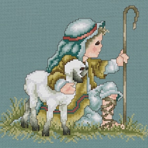 May include: A young shepherd with a blue and brown robe holds a white lamb in his arms. He is sitting on the ground with a wooden staff in his hand. The background is a light blue.