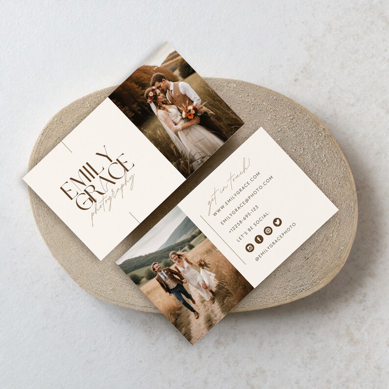 May include: A business card with a brown and white colour scheme. The front of the card has the text "EMILY GRACE photography" in a brown font. The back of the card has a photo of a couple in a field, the text "get in touch!" and contact information for Emily Grace Photography.