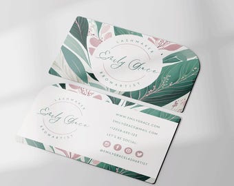 May include: A business card with a pink and green floral design. The text on the card reads "Lashmaker Browartist Early Grace" and includes contact information and social media handles.