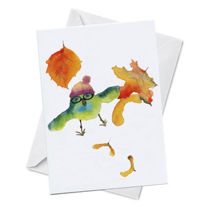 Carte de vœux - Blow’n In the Wind - Mignon petit oiseau soufflant la brise d’automne Feuilles d’automne avec lunettes Toque Aquarelle Feuille d’érable Oladesign