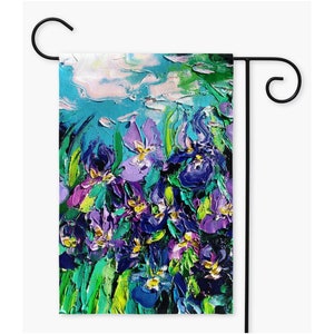 May include: A garden flag with a colorful abstract painting of purple, blue, and green flowers. The flowers are painted in a thick, textured style.