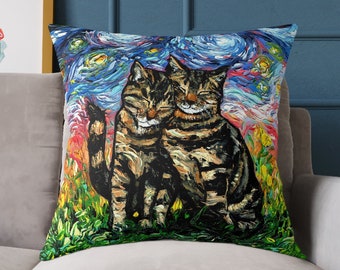 May include: Square throw pillow featuring a colorful painting of two tabby cats. The artwork has a starry night sky background with vibrant brushstrokes. The cats are depicted sitting in a field of green grass, with their eyes closed and smiling.