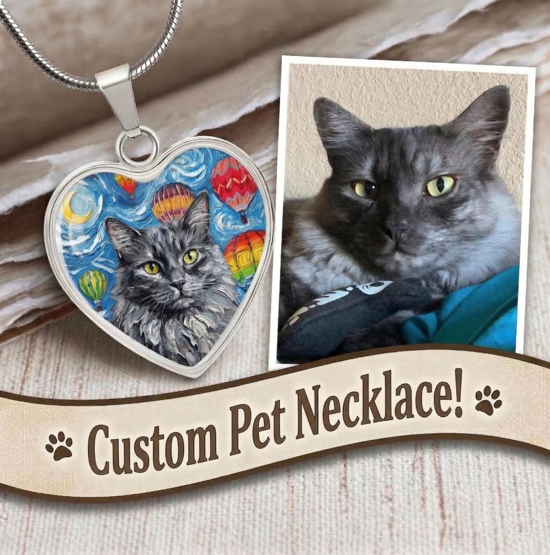 Custom Pet Portrait on a Heart Shaped Necklace by artist Aja Trier of Sagittarius Gallery choose from gold and surgical steel and even choose to have the back engraved!