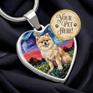 Custom Pet Portrait on a Heart Shaped Necklace by artist Aja Trier of Sagittarius Gallery choose from gold and surgical steel and even choose to have the back engraved!