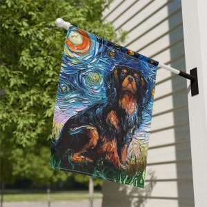 May include: A black and brown Cavalier King Charles Spaniel dog is painted in a vibrant, abstract style reminiscent of Vincent van Gogh's "Starry Night". The dog is sitting in a field of grass with a starry night sky in the background.