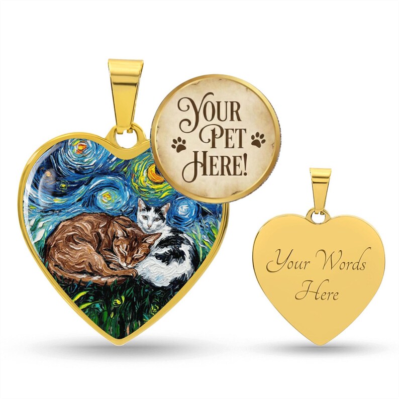 Custom Pet Portrait on a Heart Shaped Necklace by artist Aja Trier of Sagittarius Gallery choose from gold and surgical steel and even choose to have the back engraved!