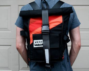 Black and red pannier backpack